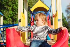 Happy Little Boy On The Playground At Sunny Day. Stock Photography Happy Little Boy On The Playground At Sunny Day. Stock Photography