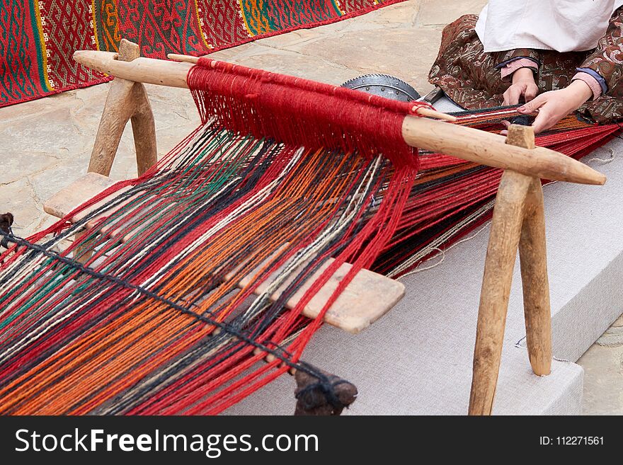 Carpet weaving.