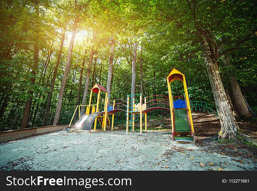 Children playground in the park in a sunny day