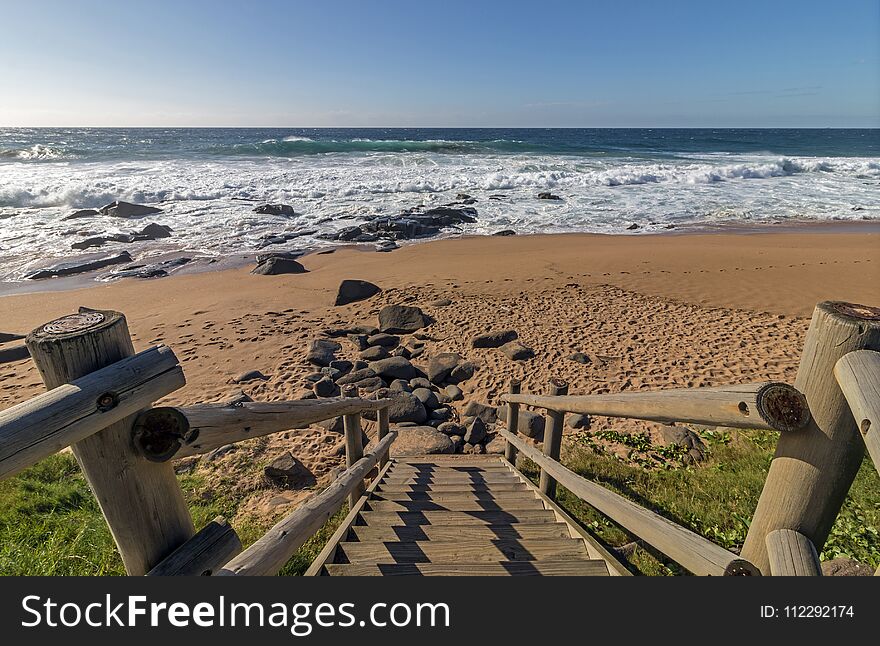 Empty Wooden Walkway Leading onto Beach in South Africa