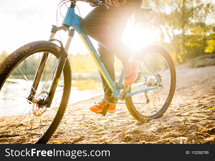 Photo of woman riding bicycle on summer day