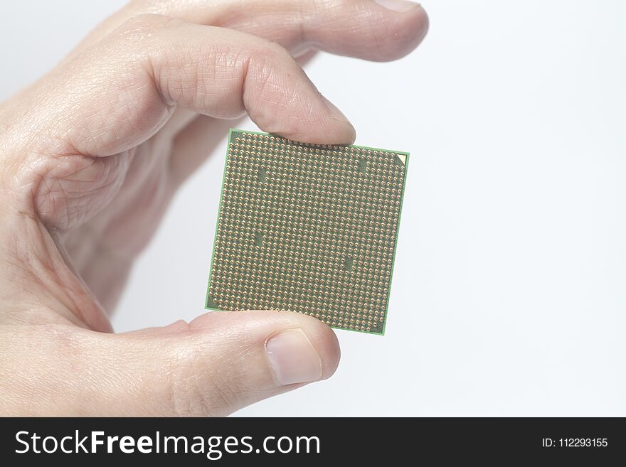 Central processing unit CPU microchip male hand holding isolated on white