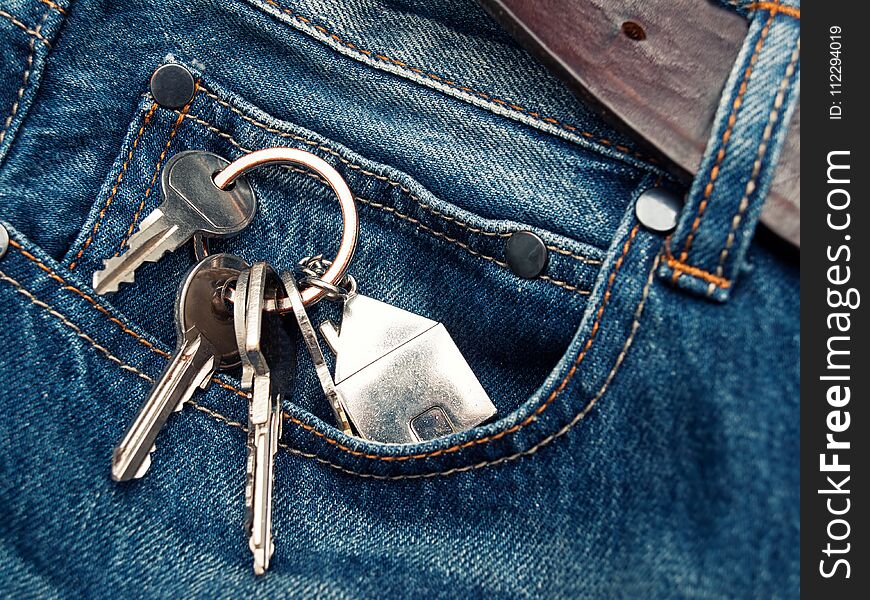 House keys in the jeans pocket. House keys in the jeans pocket.