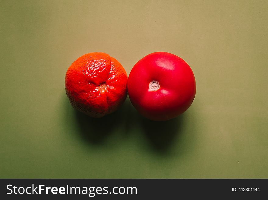 Two Red Tomatoes