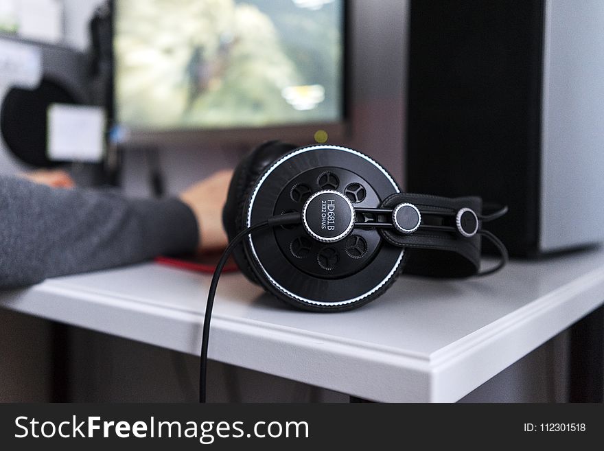 Black Corded Headset on White Table
