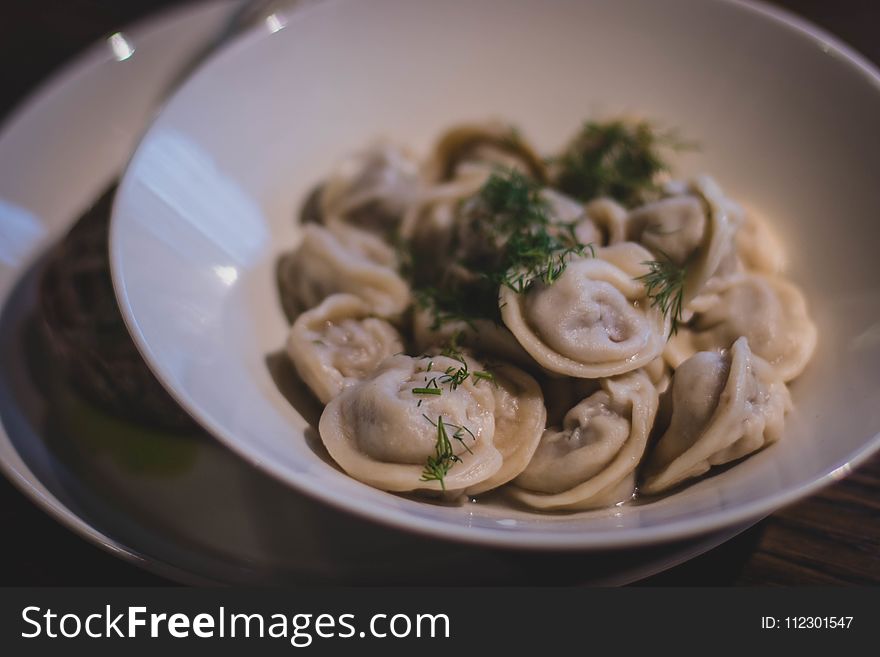 Cooked Dumplings In White Ceramic Bowl