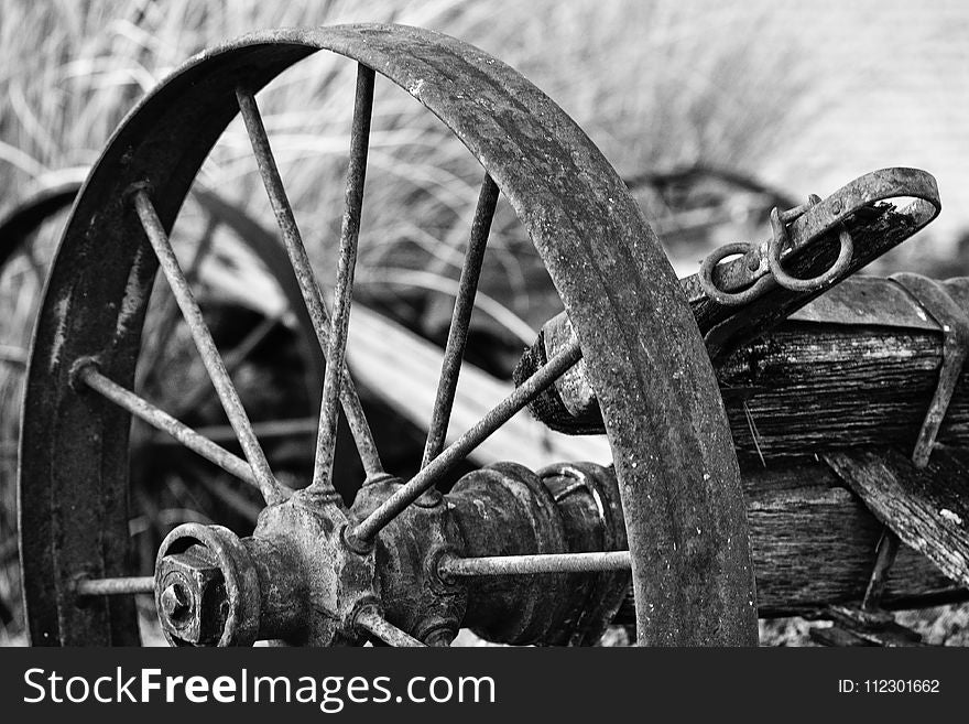 Rusted Wheel Grayscale Photo