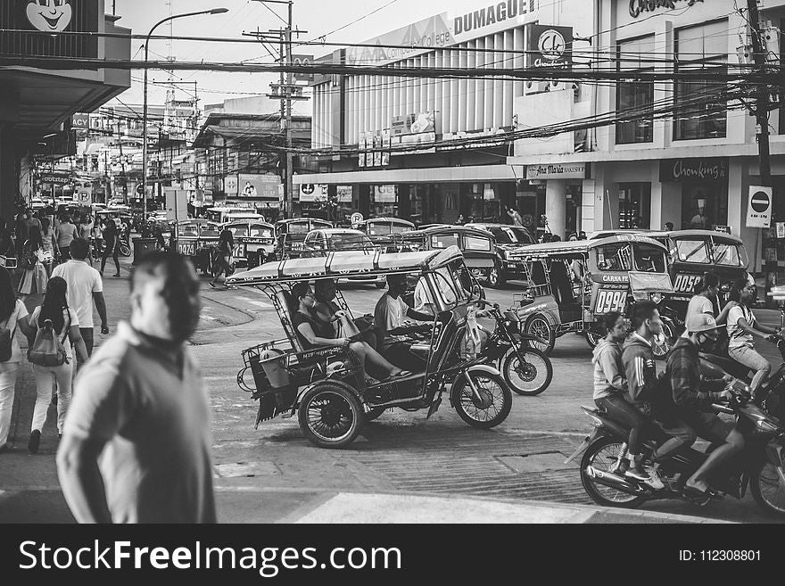 Grayscale Photo Of Motorcycles And People