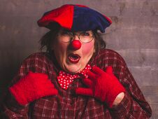 Feminine Clown Comedy Emotional Expression With Red Nose, Carnival Kids Concept Royalty Free Stock Images