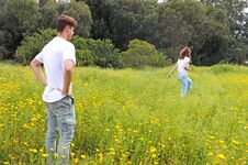 A Teenage Young Couple Having Fun In A Field Of Chrysanthemum Royalty Free Stock Image A Teenage Young Couple Having Fun In A Field Of Chrysanthemum Royalty Free Stock Image
