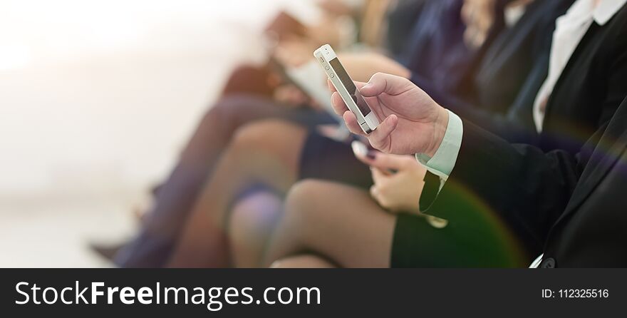 Closeup of colleagues sitting at a business conference.photo with copy space