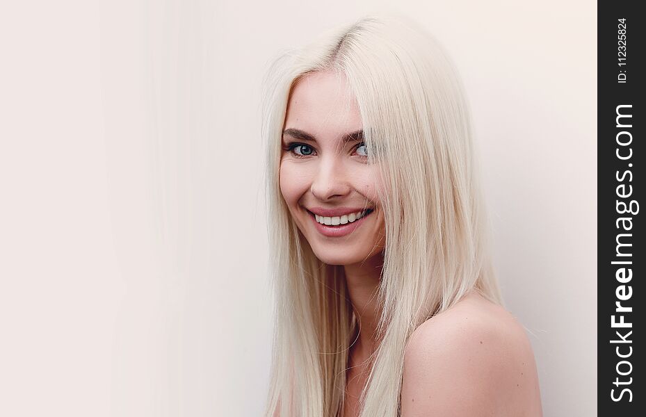 Close-up face of beautiful blonde woman.