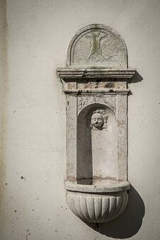 Small Historical Water Fountain On The Old Yellowed Wall Stock Photography Small Historical Water Fountain On The Old Yellowed Wall Stock Photography