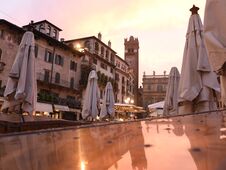 Piazza Delle Erbe And Gardello Tower At The Background In Center Royalty Free Stock Photos
