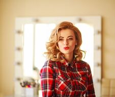 Gorgeous Woman Try On Makeup In Mirror In Home Studio Of Beauty Royalty Free Stock Photo