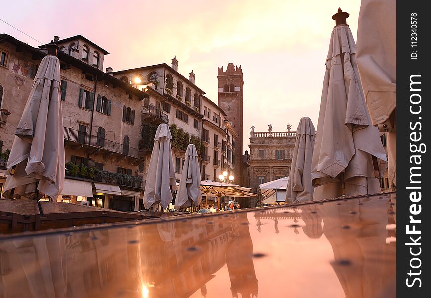 Piazza delle Erbe and Gardello tower at the background in center of Verona city, Italy