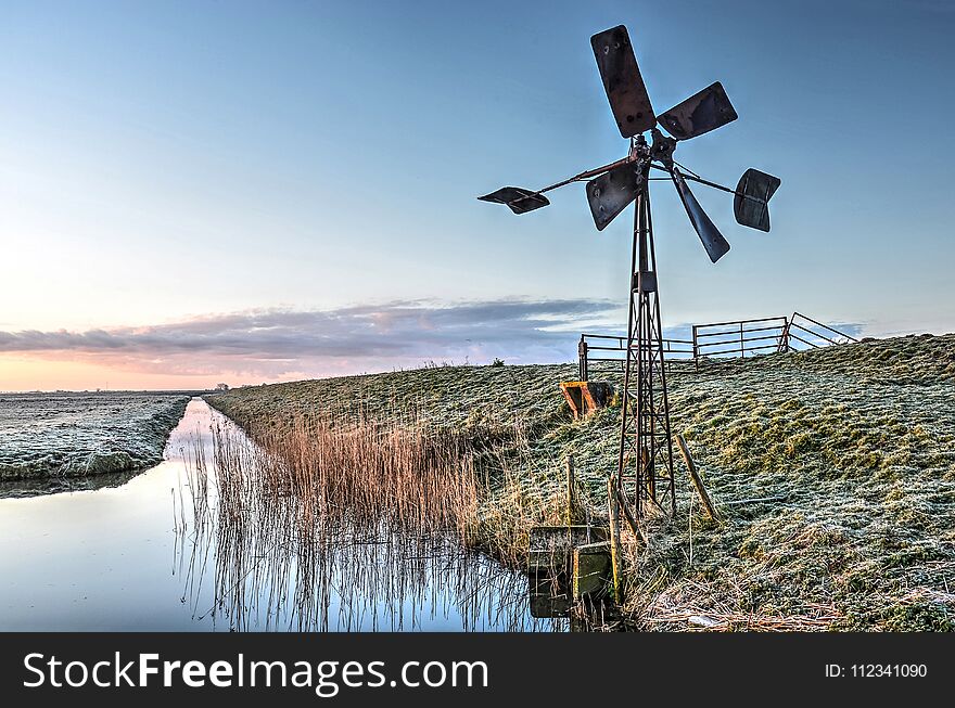 Windmill by the side of a ditch