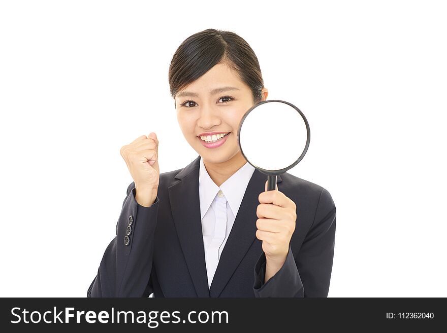 Woman With A Magnifying Glass