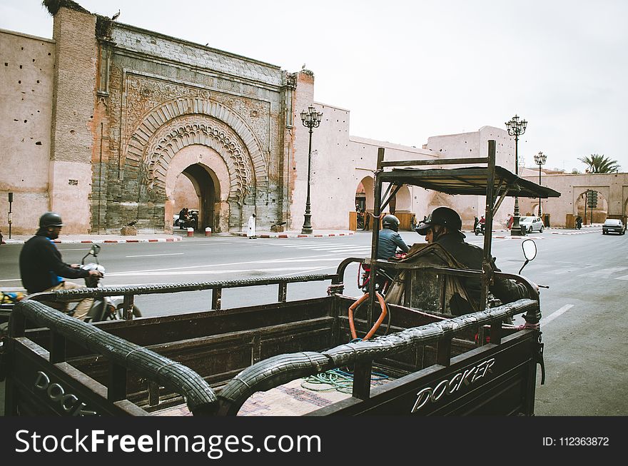 Person Riding Auto Rickshaw
