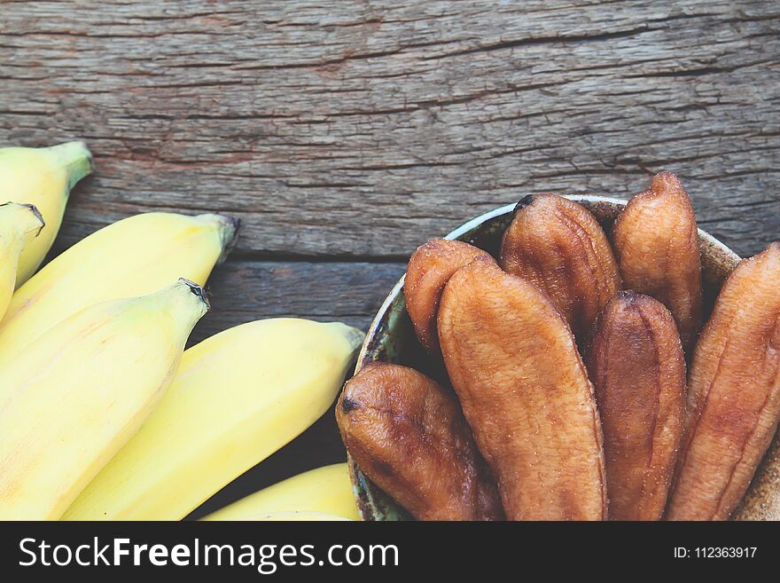 Dried banana, dried fruit on wooden background, Healthy food