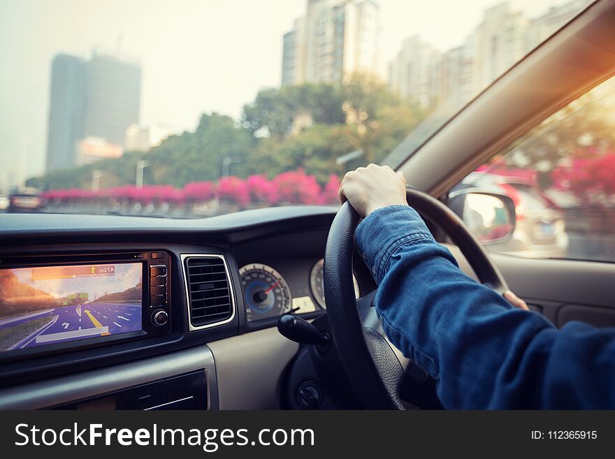 Hands on wheel driving car