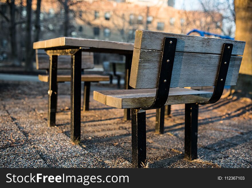 Sunset, winter, little bench in the park