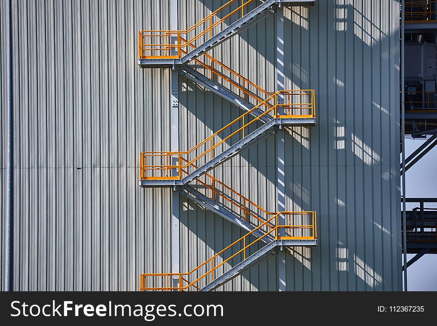 Metal staircase on industrial exterior. Metal staircase on industrial exterior