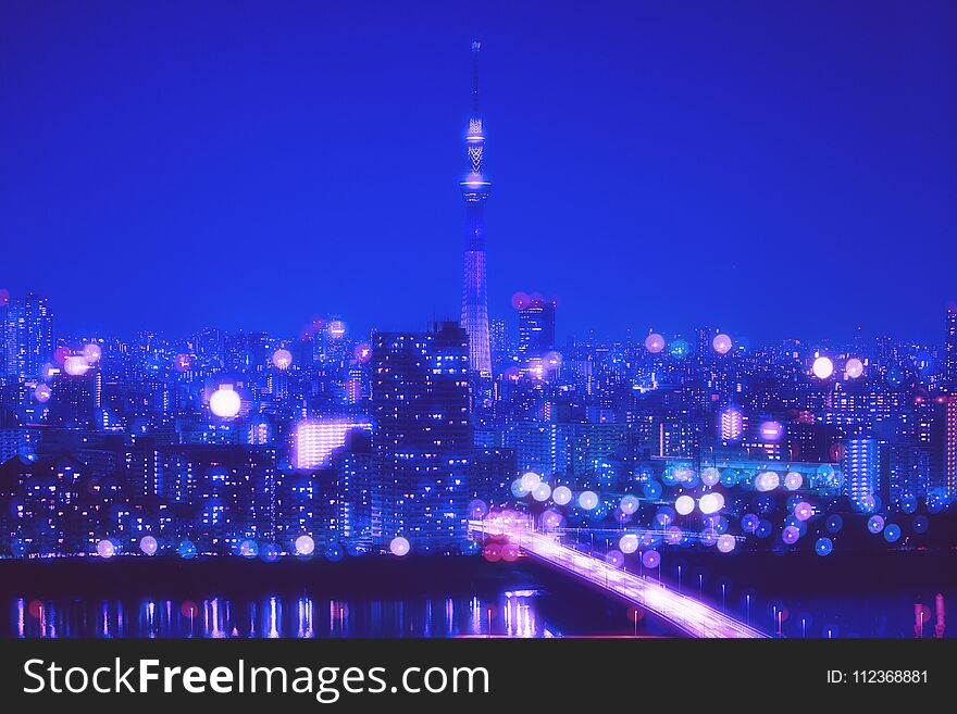 Nightlife Background in Tokyo. Tokyo Skyline with Blur Bokeh Lights Decoration in Colorful Filter. Tokyo Sky Tree Cityscape Background. Night sky and nightlife concept in Tokyo city. Nightlife Background in Tokyo. Tokyo Skyline with Blur Bokeh Lights Decoration in Colorful Filter. Tokyo Sky Tree Cityscape Background. Night sky and nightlife concept in Tokyo city.