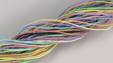 Twisted Multicolored Cables And Wires On White Surface Royalty Free Stock Images