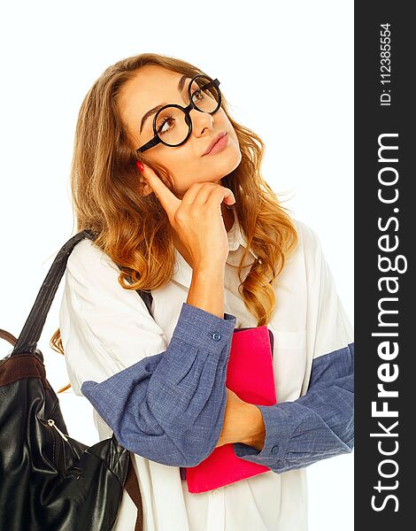 Pretty young student with book wearing glasses over white background. Pretty young student with book wearing glasses over white background