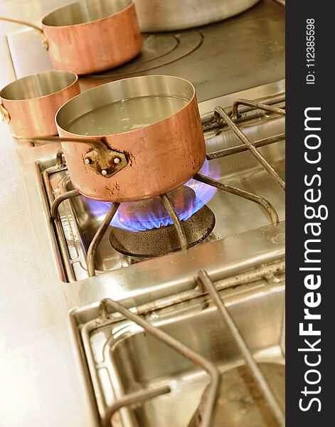 Preparing Dinner Food In Restaurant Kitchen