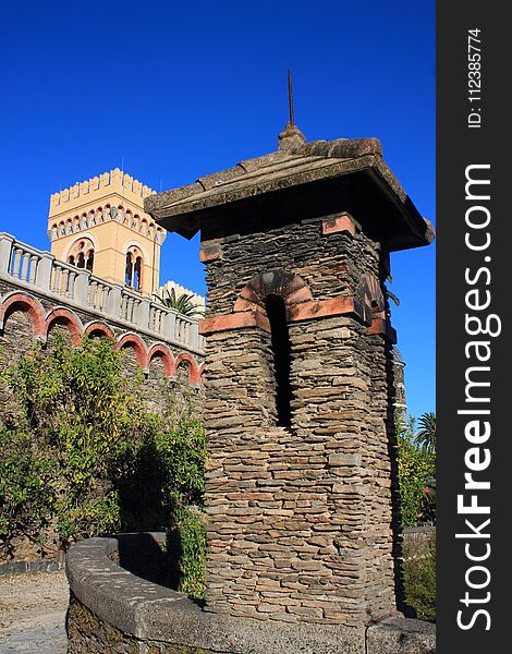 Medieval guard tower in the castle inside Villa Pallavicini in Arenzano, Italy.