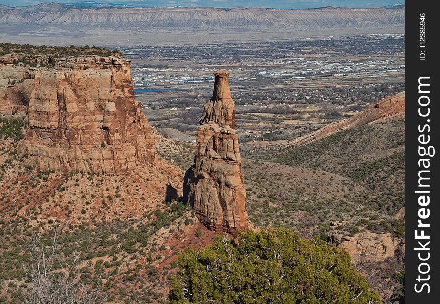 Colorado National Monument offers spectacular views of mountains and rock formations. Beautiful in Winter. Near Grand Junction. Steep cliffs and deep canyons of red rock. Colorado National Monument offers spectacular views of mountains and rock formations. Beautiful in Winter. Near Grand Junction. Steep cliffs and deep canyons of red rock.