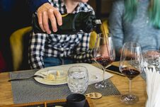 Sommelier At Wine Tasting Pouring Wine From A Bottle Into Glass At Blind Wine Tasting Stock Photography Sommelier At Wine Tasting Pouring Wine From A Bottle Into Glass At Blind Wine Tasting Stock Photography