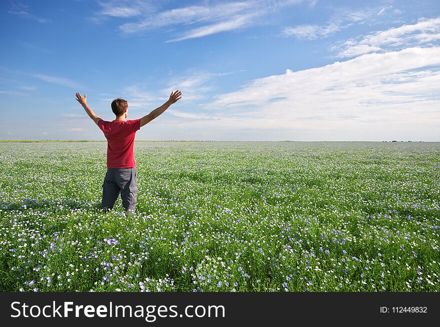 Man in green meadow.