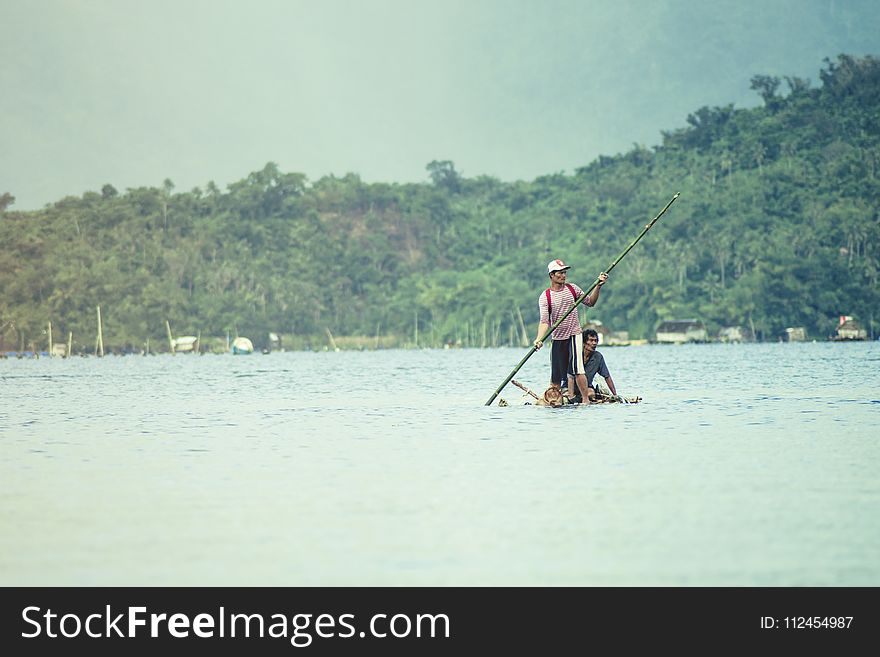Photo of Men Fishing