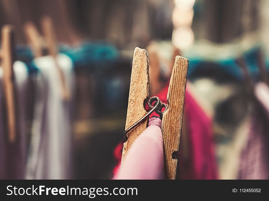 Close-up Photography of Wooden Clothespin