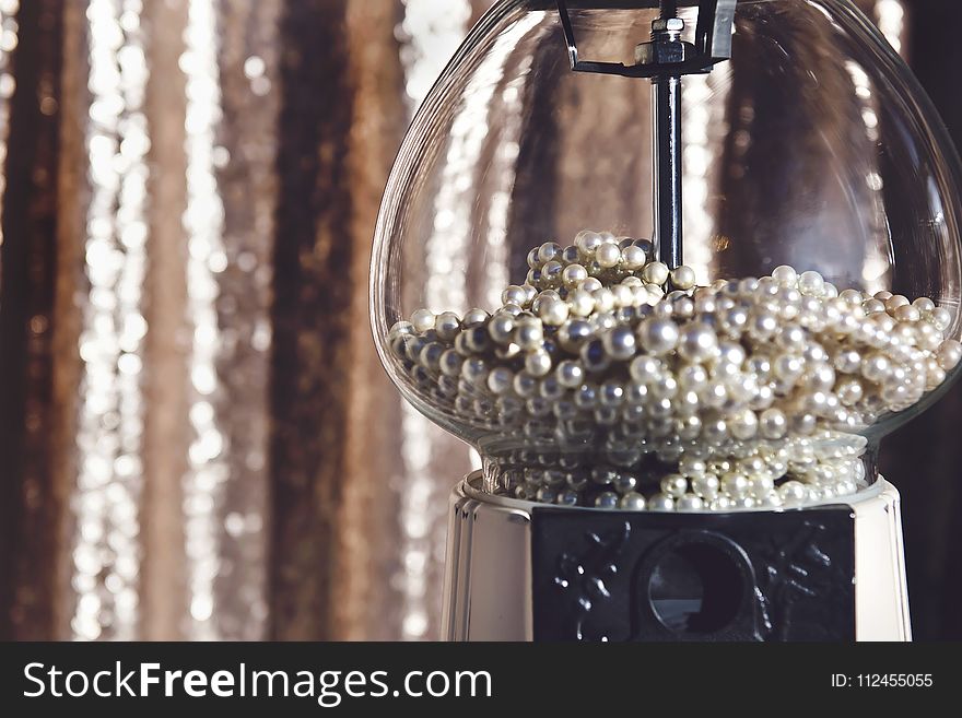 Close-up Photography of Clear Glass Candy Dispenser