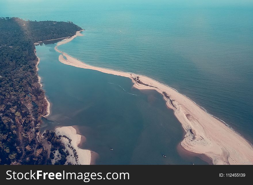 Above Ground Photo Of Body Of Water On Daytime