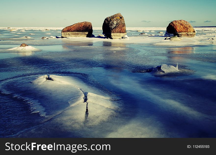 Three Monoliths In Iced Water