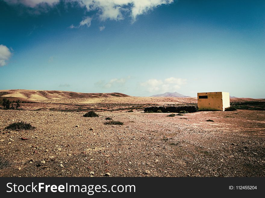 White Concrete Building on Desert