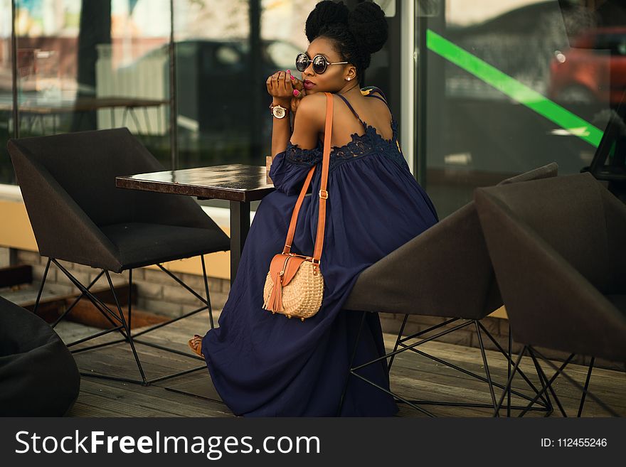 Woman Wearing Blue Spaghetti Strap Dress