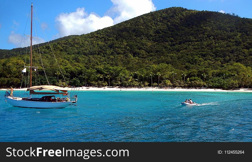 Group of People on White Speed Boat