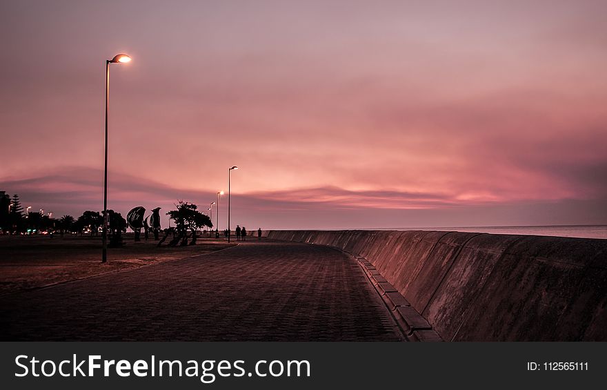 Concrete Road During Nighttime