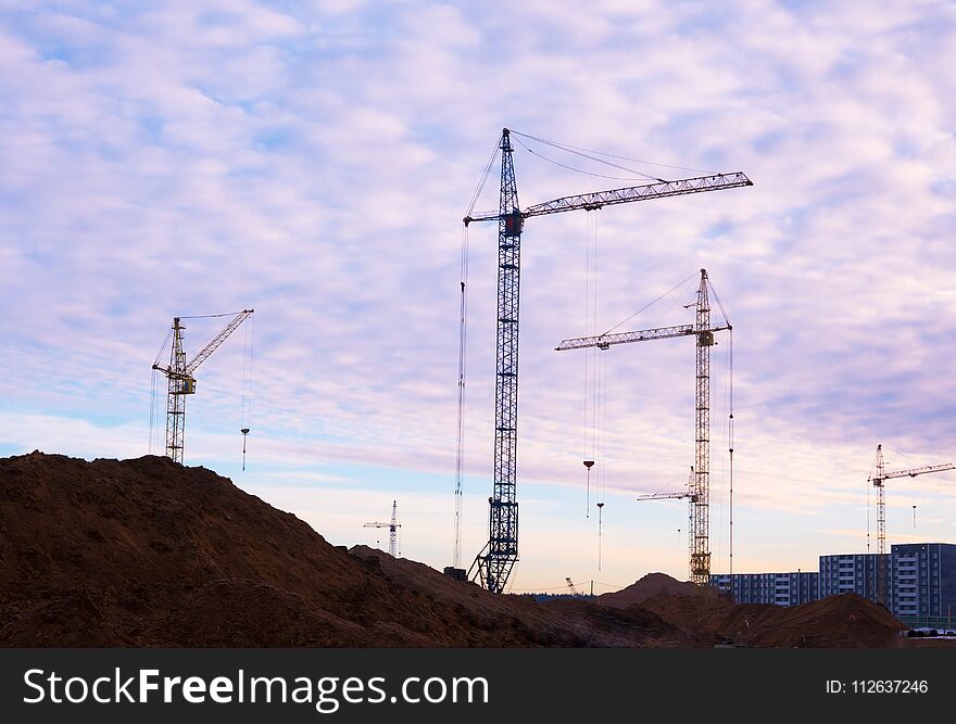 Crane And Building Construction Site At Sunset, Sunrise