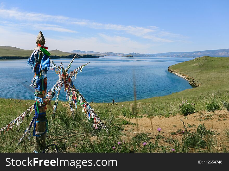 Lake Baikal, Beautiful Blue Water And Sky And Totems