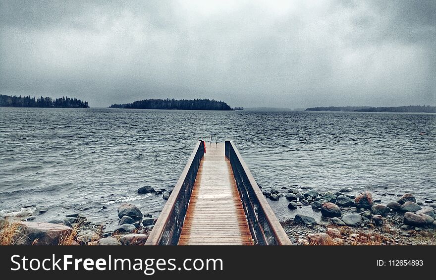 A view to a wooden dock in Helsinki. A view to a wooden dock in Helsinki