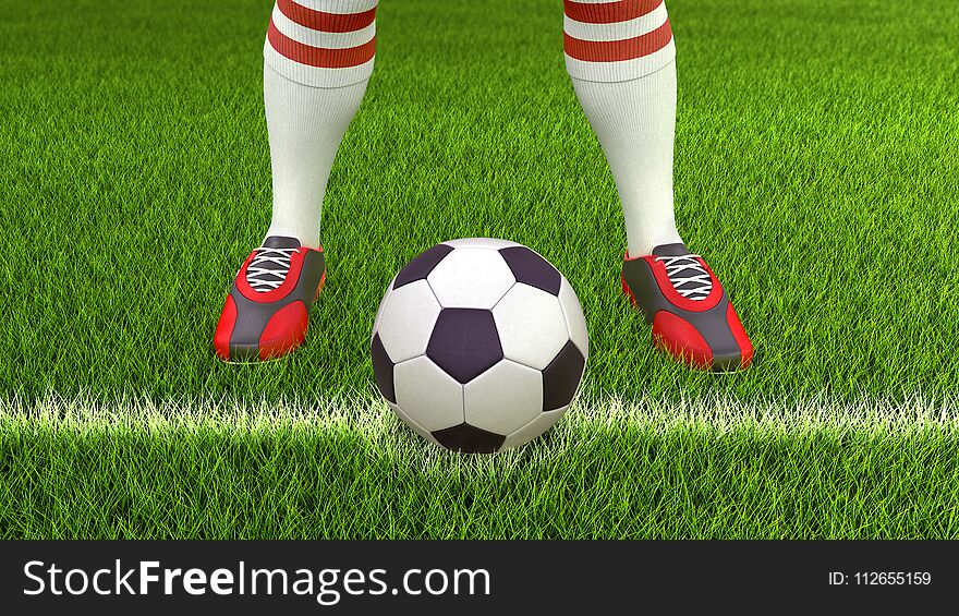 Man With A Soccer Ball On Grass