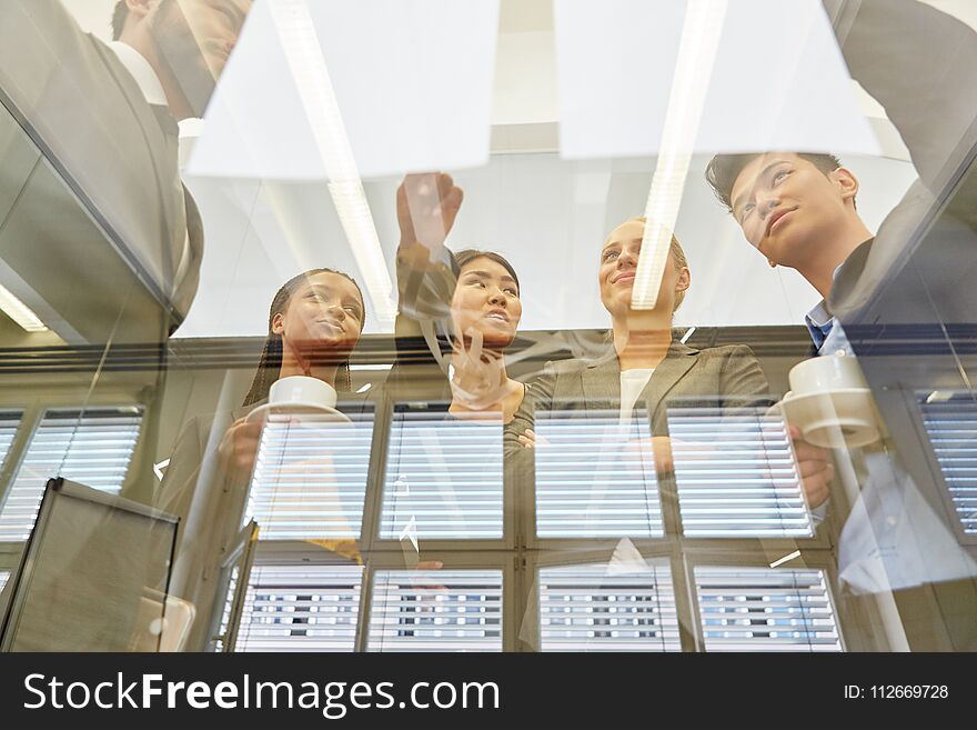 Business people in a meeting as a team planning and cooperating