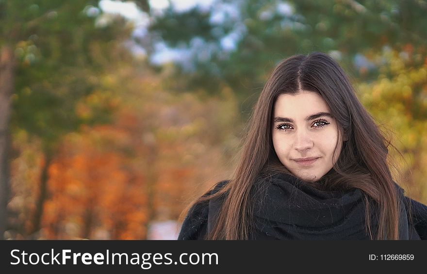 Selective Focus Photo of Woman in Black Top